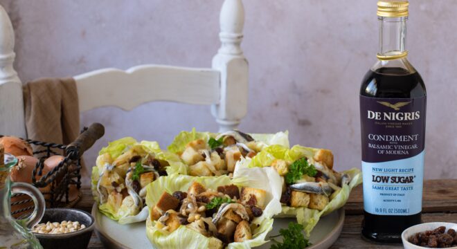 Lettuce cups with Anchovies, Onion, Pine Nuts and Raisins​